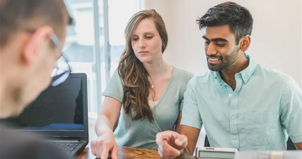 Couple asking a Canadian advisor whether personal loans taxable rules apply to their loan