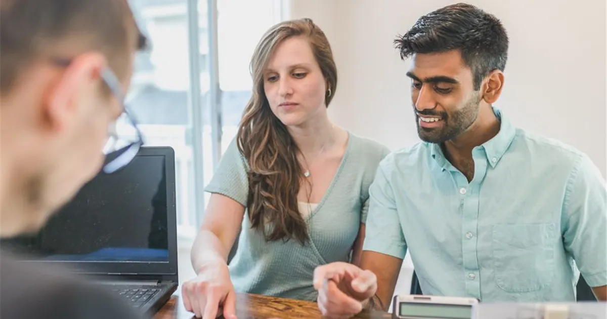 Couple asking a Canadian advisor whether personal loans taxable rules apply to their loan