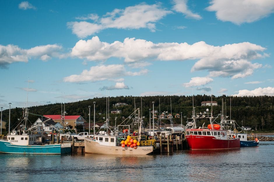 Fishing boats at a Bay of Fundy harbour, New Brunswick - personal loans New Brunswick