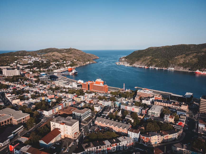 Elevated view of St. John's vibrant cityscape and picturesque harbor. - personal loan Canada