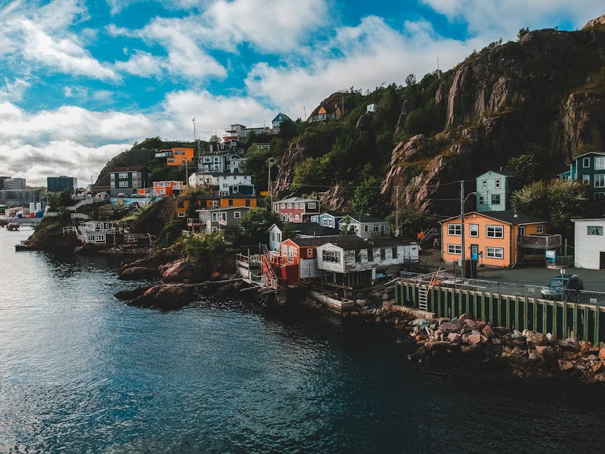 Colourful homes of The Battery on the cliffs of St. John
