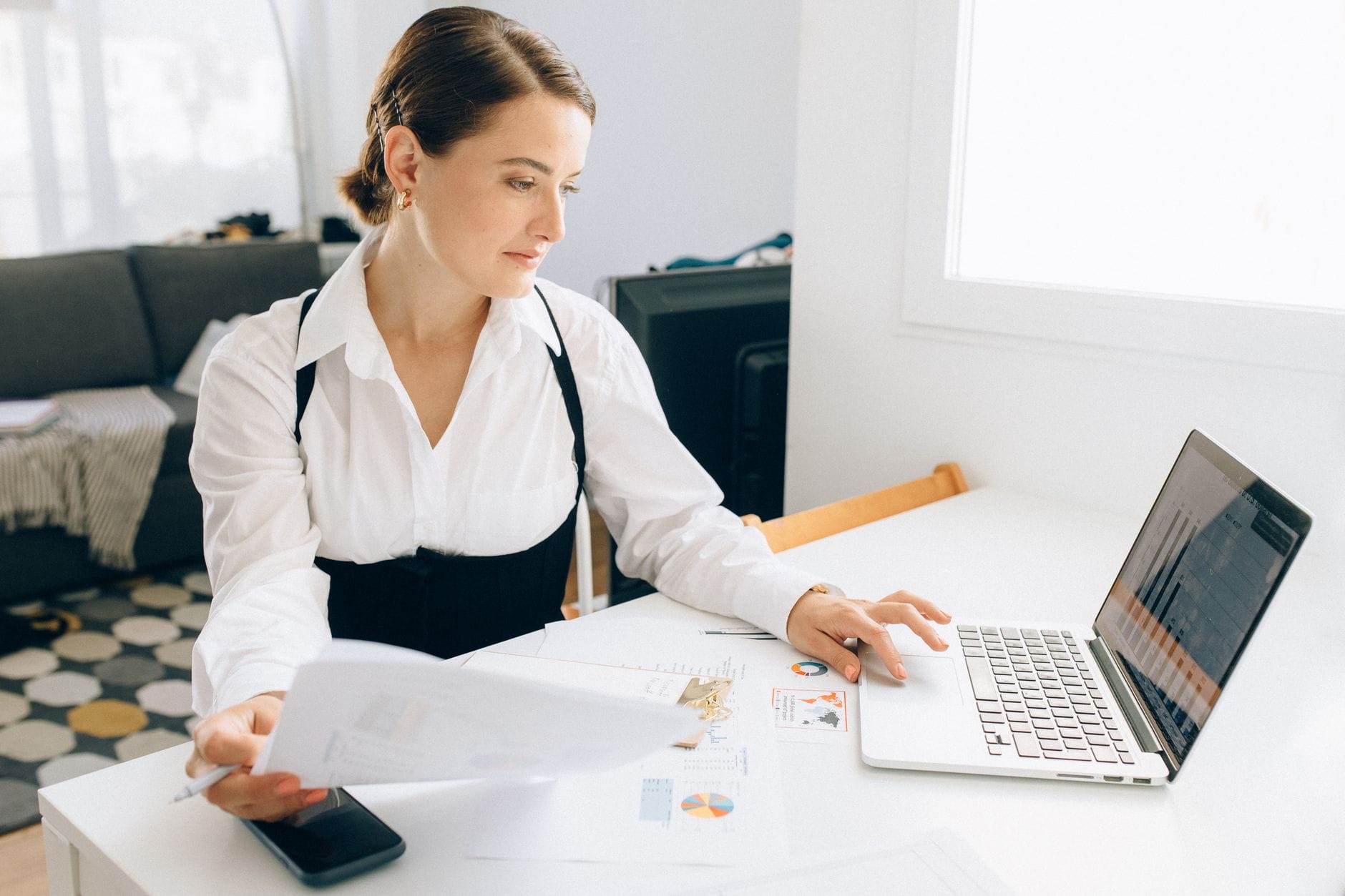 Reviewing online installment loan options on a laptop at home in Canada from $100 to $5,000