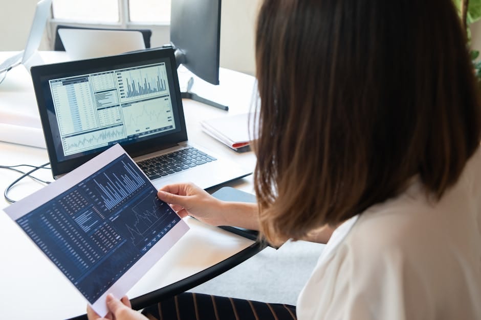Reviewing finances on a laptop - second chance loans Canada