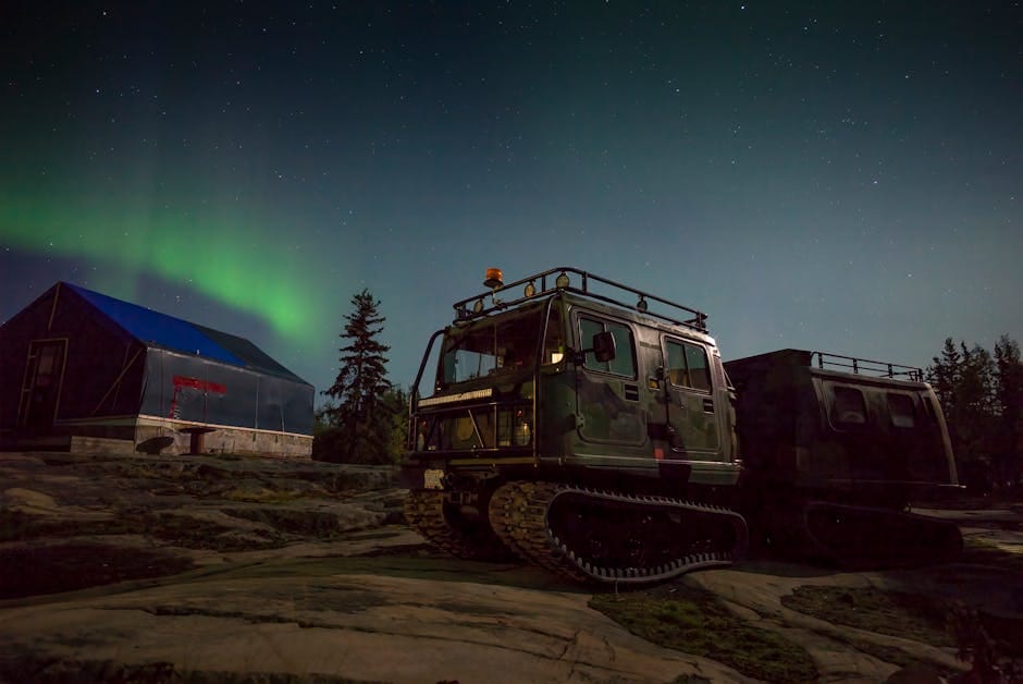 Vehicle under the aurora borealis in Yellowknife, NT, Canada - personal loan Northwest Territories