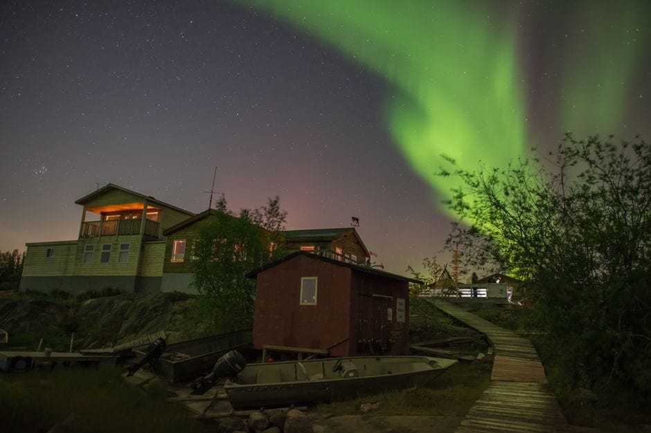 Northern lights over a home in Yellowknife, Canada - online personal loan Yellowknife NWT