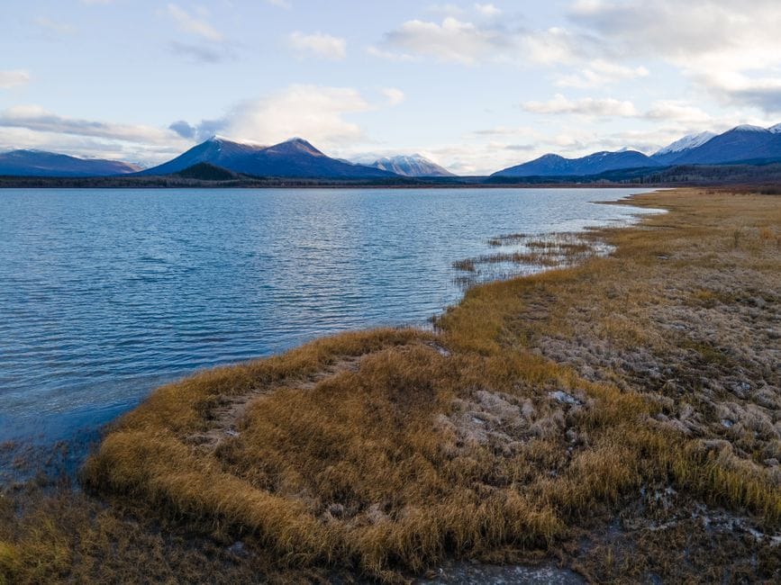 Serene lake and mountains in the Yukon, Canada - online personal loans Yukon Territory