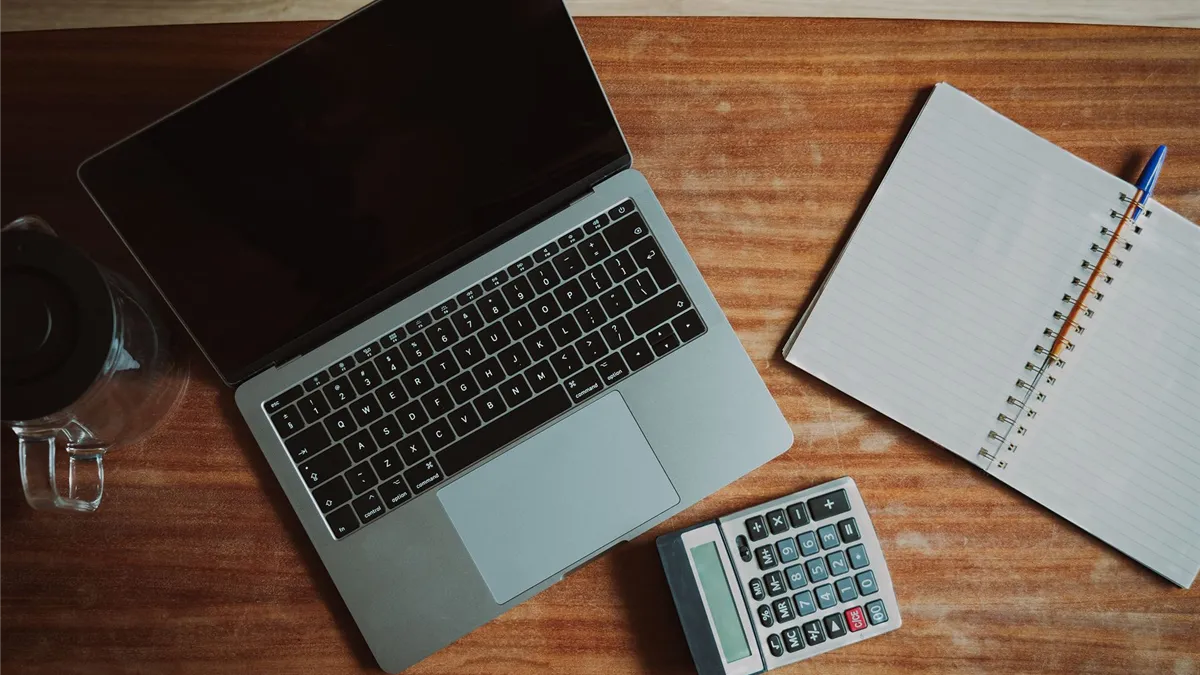 Planning installment loans Ontario payments with a calculator and notebook