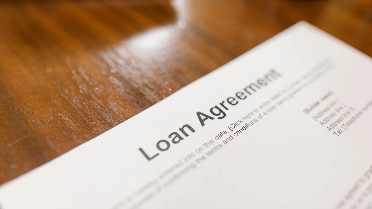 Close view of a personal loan agreement, the document to read before signing any bad credit loan